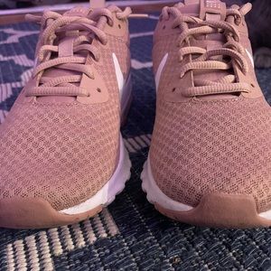 Pink Nike running shoes